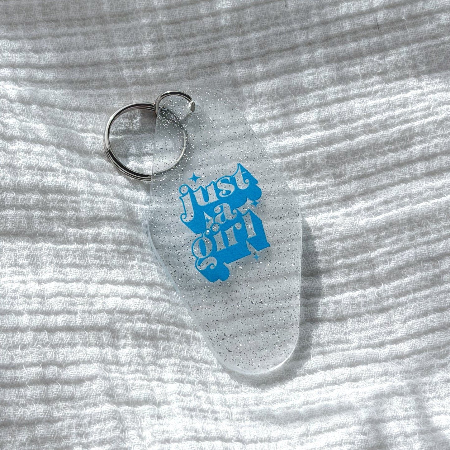 just a girl keychain