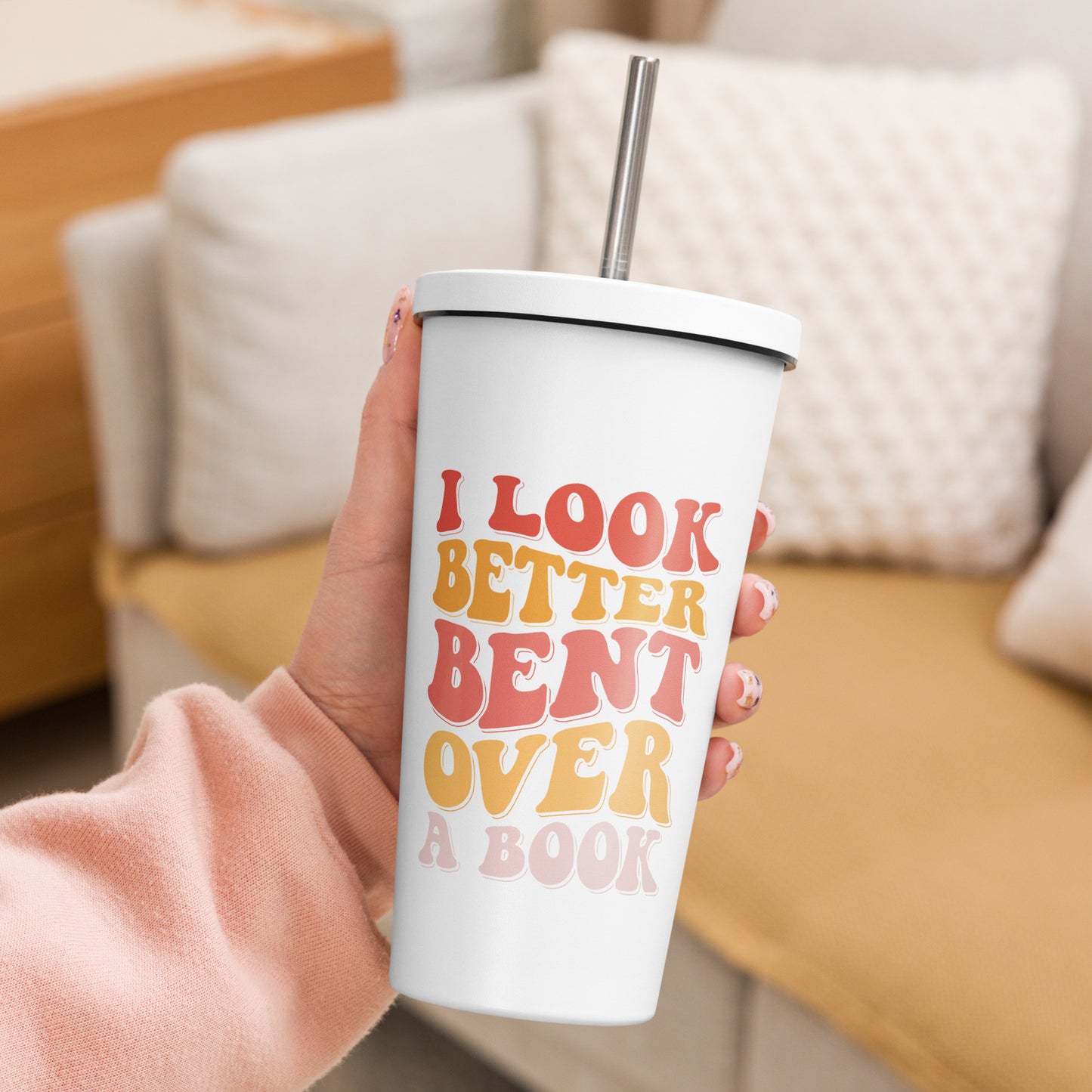 bent over a book tumbler (white)