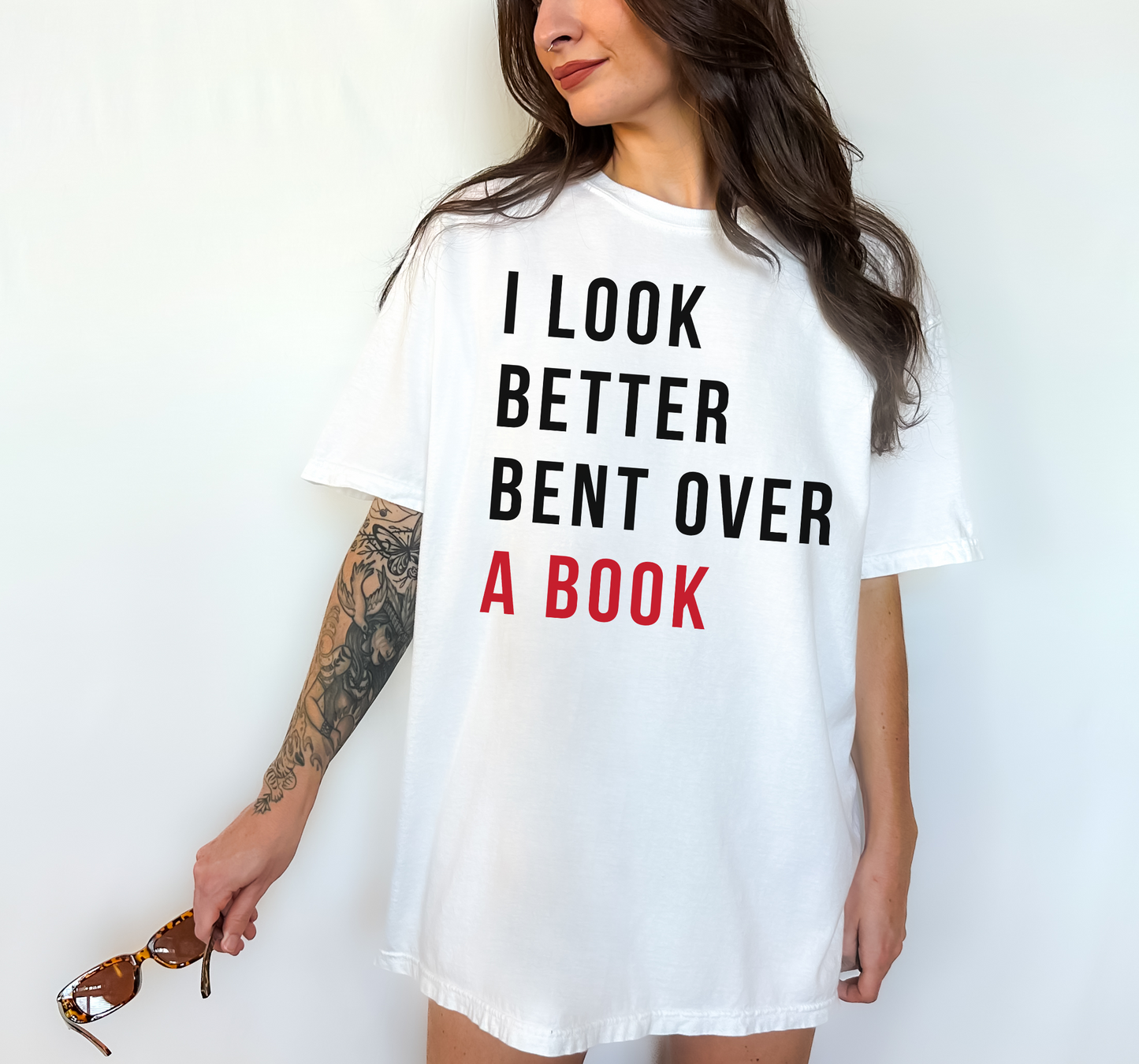 bent over a book (taylor's version) graphic tee